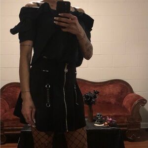 Black short sleeve top with bow detail